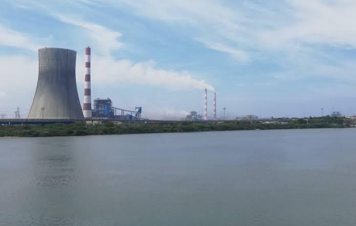 Ash dyke pond construction company in India with HDPE geomembrane lining installation